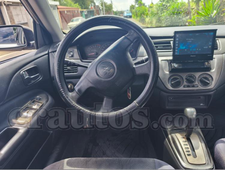 Mitsubishi LANCER GLX 2004 - foto 1